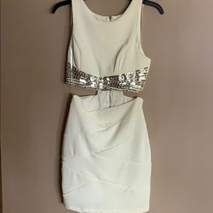 White dress with sequins. Gives two piece effect.